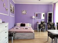 Posteľ alebo postele v izbe v ubytovaní Apartament Lawendowy