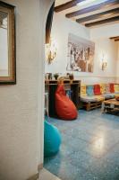 A seating area at LOFT HOSTAL Group
