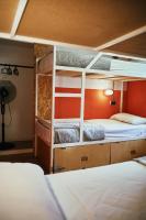 A bed or beds in a room at LOFT HOSTAL Group