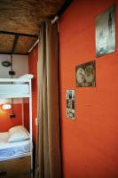 A bed or beds in a room at LOFT HOSTAL Group