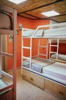 A bed or beds in a room at LOFT HOSTAL Group