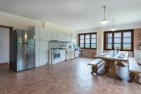 Kuchyň nebo kuchyňský kout v ubytování Villa Montepescini