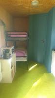 Posteľ alebo postele v izbe v ubytovaní Logement insolite au cœur de l'Auvergne