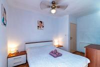 Posteľ alebo postele v izbe v ubytovaní Apartment Tri Zala 4432b