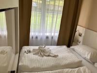 Posteľ alebo postele v izbe v ubytovaní Residence AlpenHeart