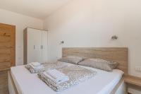 Postel nebo postele na pokoji v ubytování Villa Roma Portorose
