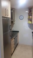 Kuchyň nebo kuchyňský kout v ubytování Apartamento Carabuxeira 1