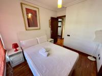 Postel nebo postele na pokoji v ubytování Apartamento Reyes de España / Free Parking & Wi Fi