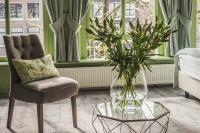 Ein Sitzbereich in der Unterkunft 't Hotel