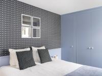 Ein Bett oder Betten in einem Zimmer der Unterkunft 't Hotel