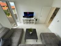 Televízia a/alebo spoločenská miestnosť v ubytovaní Luxury Apartment Dalia Rijeka
