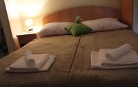 Posteľ alebo postele v izbe v ubytovaní Guesthouse Podaca