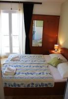 Posteľ alebo postele v izbe v ubytovaní Guesthouse Podaca