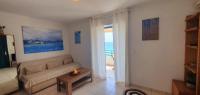 A seating area at Glyfada Beach House