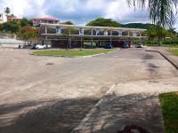 an empty parking lot in front of a building at Appartement d&#39;une chambre avec balcon et wifi a Le Vauclin a 3 km de la plage in Le Vauclin