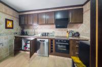 Kuchyň nebo kuchyňský kout v ubytování Villa Del Sol