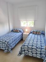 Postel nebo postele na pokoji v ubytování Apartamentos Montedunas