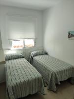 Postel nebo postele na pokoji v ubytování Apartamentos Montedunas