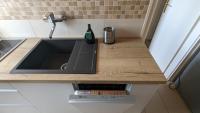 Kuchyňa alebo kuchynka v ubytovaní Virágos Apartman Balatonszemes