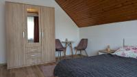 Posteľ alebo postele v izbe v ubytovaní Virágos Apartman Balatonszemes