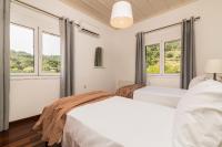 Łóżko lub łóżka w pokoju w obiekcie Villa Verdi - Your Family Oasis!