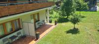 A garden outside Appartement Dallavia