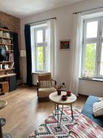 Posedenie v ubytovaní Lofts Cracow Apartments - City Center