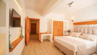 Postel nebo postele na pokoji v ubytování Datça Dirik Surf Beach Hotel