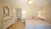 Postel nebo postele na pokoji v ubytování Datça Dirik Surf Beach Hotel