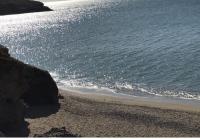a beach with a rocky shore and the ocean at Location Sète les pieds dans l&#39;eau in Sète