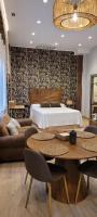 Postel nebo postele na pokoji v ubytování SUITE HAUS BAHIA