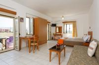 Posteľ alebo postele v izbe v ubytovaní Fotis Studios Apartments