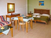 Posteľ alebo postele v izbe v ubytovaní Fotis Studios Apartments