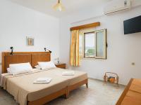 Posteľ alebo postele v izbe v ubytovaní Fotis Studios Apartments