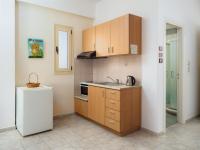 Kuchyňa alebo kuchynka v ubytovaní Fotis Studios Apartments