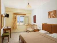 Posteľ alebo postele v izbe v ubytovaní Fotis Studios Apartments