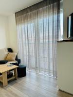 TV a/nebo společenská místnost v ubytování Apartment Rovci 2
