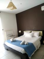 Posteľ alebo postele v izbe v ubytovaní Holiday Nest & parking