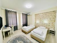 Samarkand Travelにあるベッド