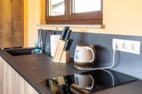 Příslušenství pro přípravu čaje a kávy v ubytování Apartments Lucija