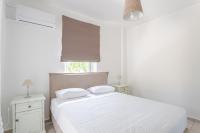 Posteľ alebo postele v izbe v ubytovaní Athanasia Holiday House