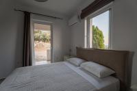Posteľ alebo postele v izbe v ubytovaní Athanasia Holiday House