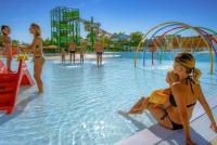 a group of people in the water at a water park at Mobil-home (Clim, Tv)- Camping Narbonne-Plage 4* - 022 in Narbonne-Plage