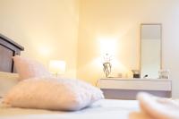 Łóżko lub łóżka w pokoju w obiekcie HOME LE SOFT Vic sur Cère