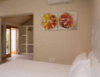 Postel nebo postele na pokoji v ubytování Boutique Hotel RifugioAzul