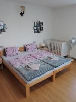 Postel nebo postele na pokoji v ubytování apartman.lara