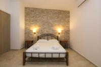 Postel nebo postele na pokoji v ubytování Villa Giorgos