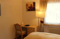 Postel nebo postele na pokoji v ubytování Hotel Conrad