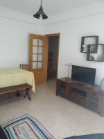 TV a/nebo společenská místnost v ubytování Apartamento em Fuseta - Casa da Praia