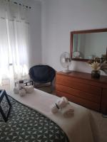Postel nebo postele na pokoji v ubytování Apartamento em Fuseta - Casa da Praia